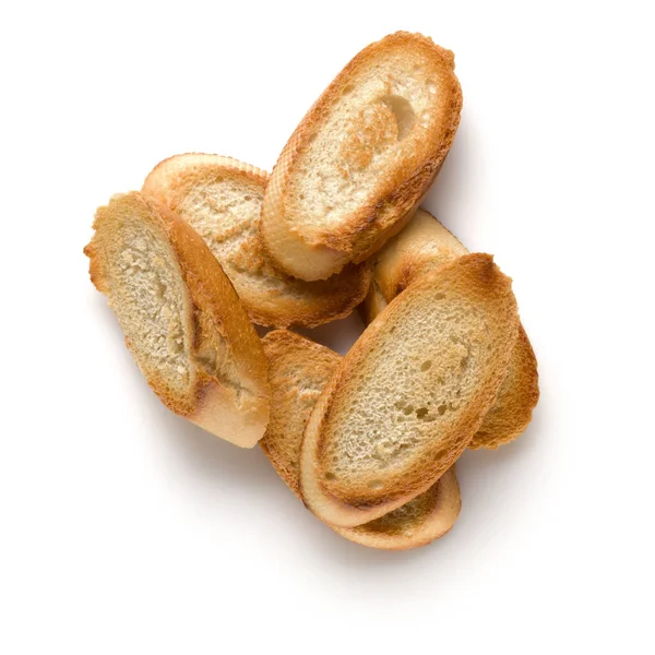 Rebanadas de baguette tostadas aisladas sobre fondo blanco de cerca . —  Fotos de Stock