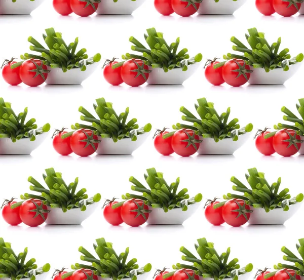 Spring onions and cherry tomato in bowl . Seamless food pattern. — Stock Photo, Image