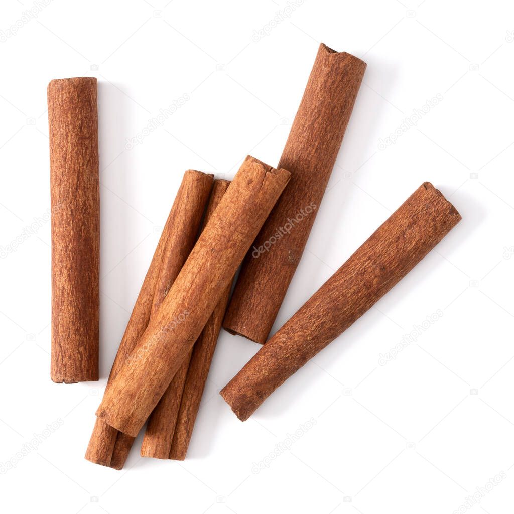 Cinnamon sticks isolated on white background closeup. Canella sp