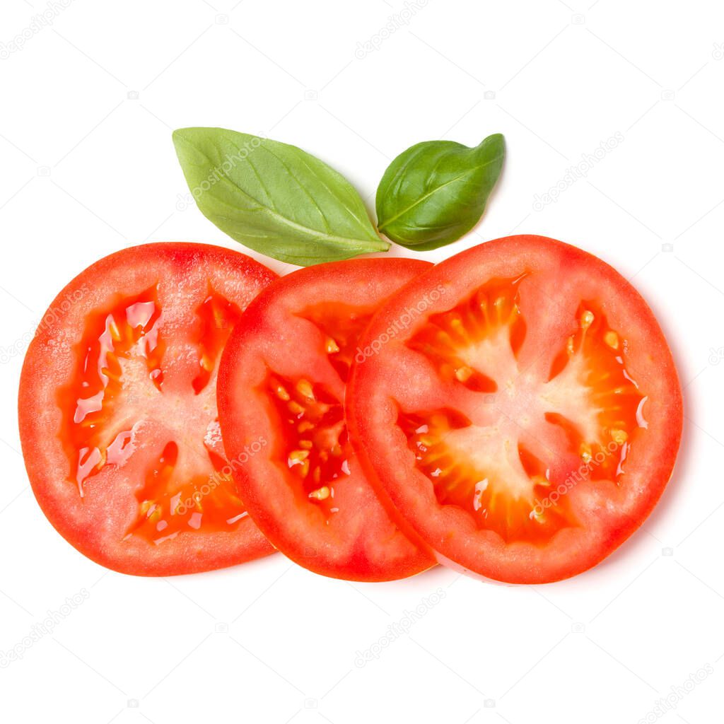 Slices of tomato and basil leaves isolated on white background. 