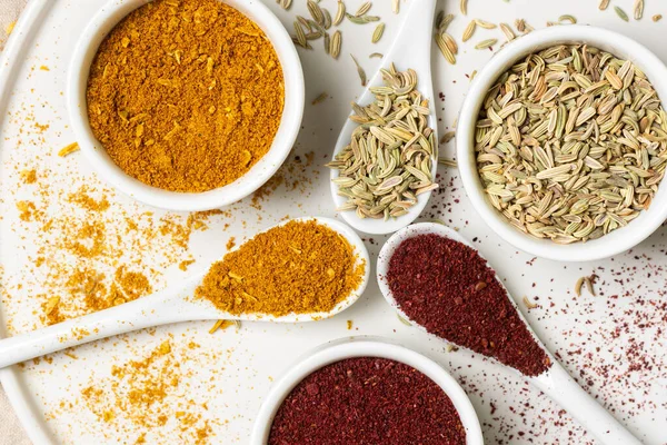Spices White Cups Spoons Light Gray Table Fennel Sumac Curry — Stock Photo, Image