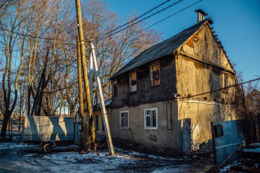 Old poor slum house in Voronezh, poverty concept clipart