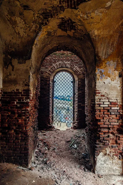 Old vaulted corridor of ruined abandoned church