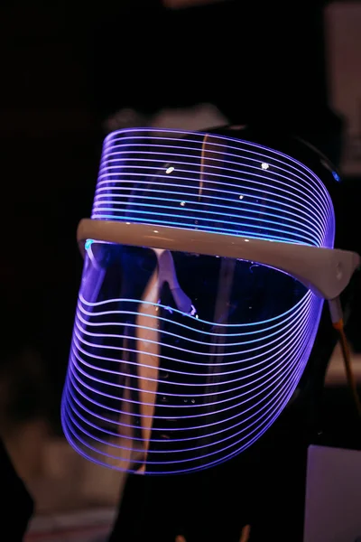 Mask in the futuristic cyberpunk style with neon light.