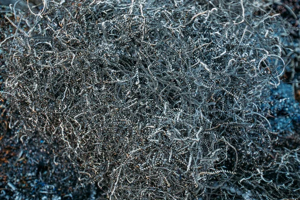 Metal shavings after working of milling machine, close up — Stock Photo, Image