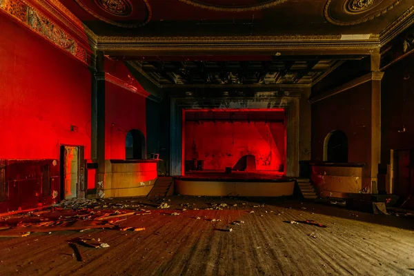 Old burnt creepy abandoned ruined haunted theater.