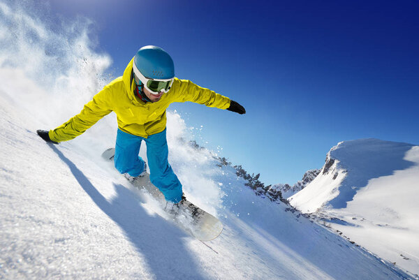 Skier in the freeride - mountains at sunny day.