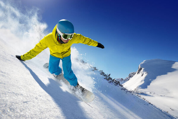 Skier in the freeride - mountains at sunny day.