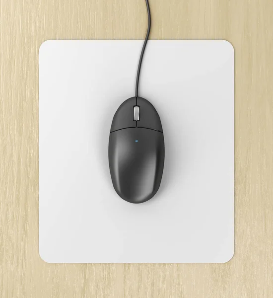 Black computer mouse on a mouse pad, top vie