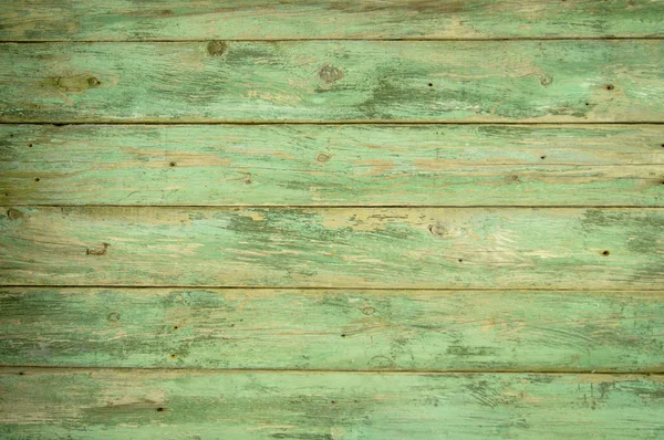 Zöld színű régi faházak Stock Kép