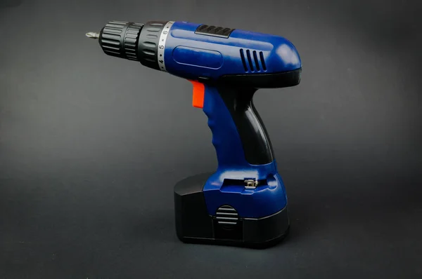 convenient reliable screwdriver on black background