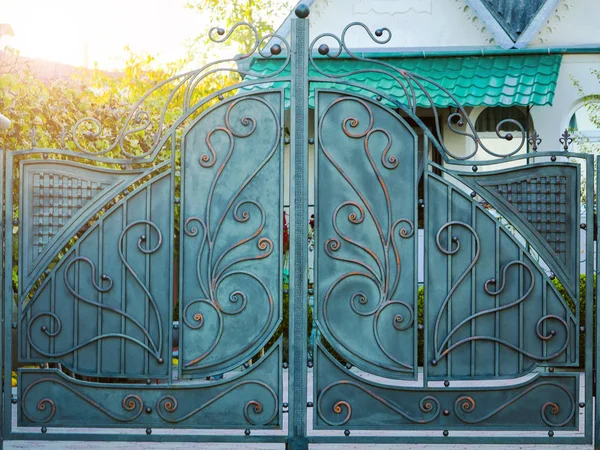 Details, structure and ornaments of forged iron gate.