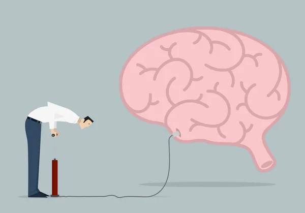 Improving Knowledge Concept: man pumps up a brain. — Free Stock Photo