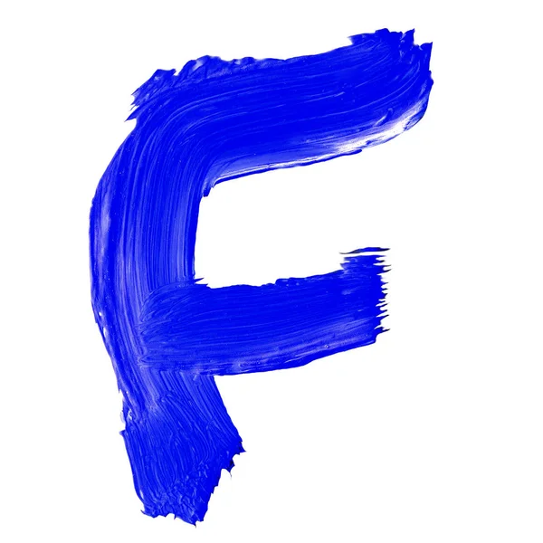 La lettera F disegnata con vernici blu su sfondo bianco . — Foto Stock