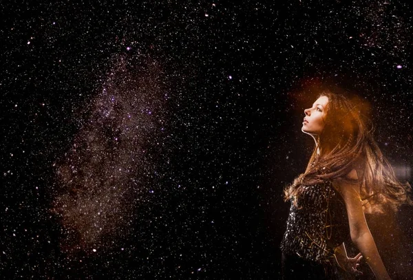 Woman in Cosmic space. Stars in Milky Way Galaxy as a background — Stock Photo, Image