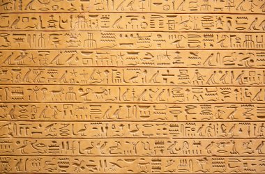Egyptian hieroglyphs on the wall clipart