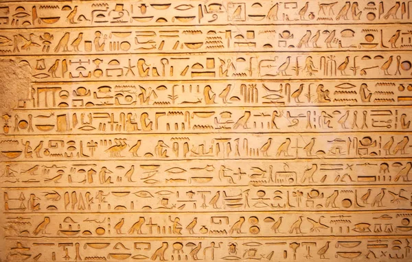 Egyptian hieroglyphs on wall Royalty Free Stock Photos
