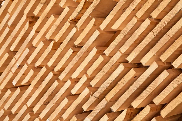 Stack of new wooden studs — Stock Photo, Image