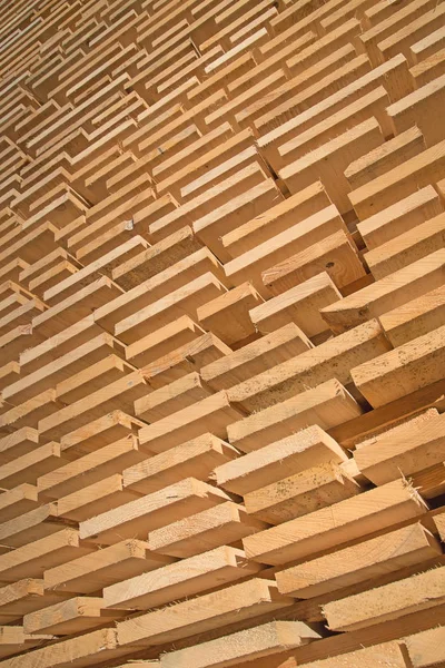 Stack of new wooden studs — Stock Photo, Image