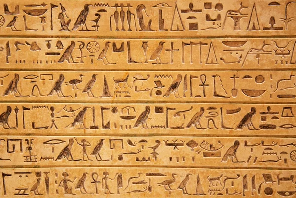 Egyptian hieroglyphs on wall Royalty Free Stock Images