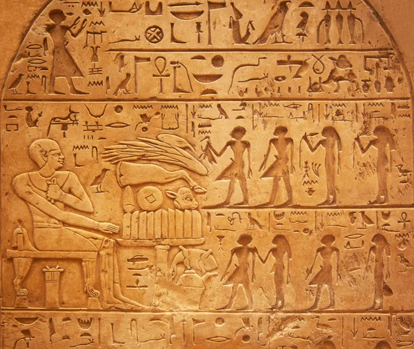 Closeup of Egyptian hieroglyphs on wall