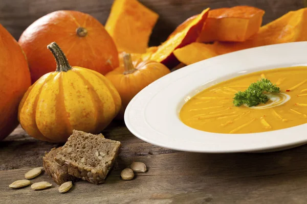 Rustic Pumpkin Soup And Pumpkins — Stock Photo, Image