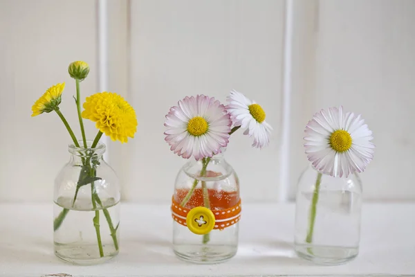 Little Spring Flowers In Decorative Vases — Stok fotoğraf