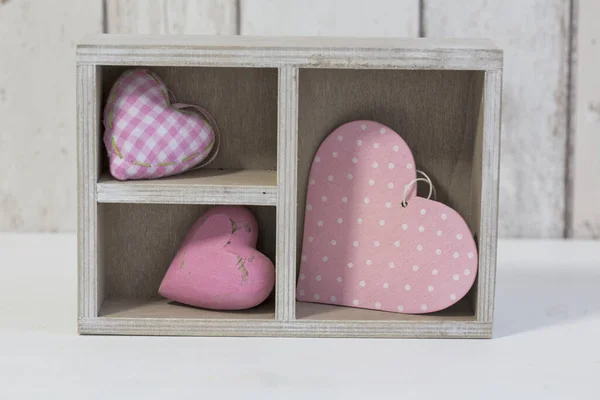 Colección de corazón en jaula de madera — Foto de Stock