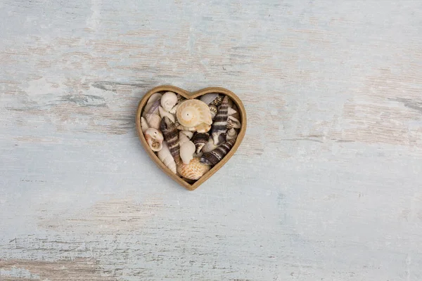 Heart Shaped Box Filled Shells Wooden Textured Background Copy Space — Stock Photo, Image