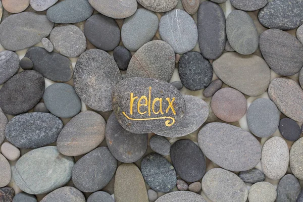 Smooth Grey Pebble Handwritten Word Relax Golden Letters Perfect Greeting — Stock Photo, Image