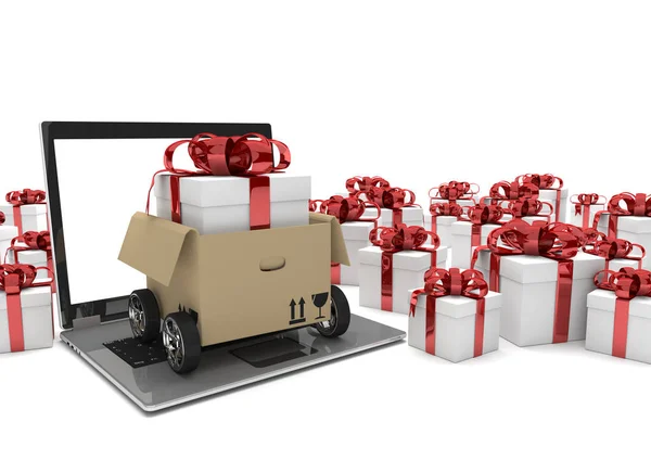 Laptop y cajas de regalo — Foto de Stock