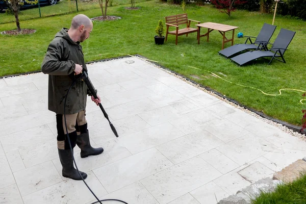 Man Cleans Terrace High Pressure Water Blaster — Stock Photo, Image