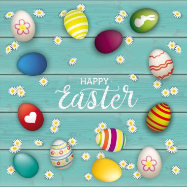 Colored eggs with daisy flowers and text Happy Easter.  Eps 10 vector file. clipart