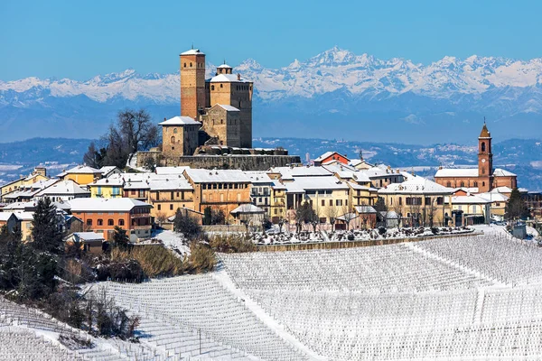 Small medieval town on snowy hill in Italy. — ストック写真