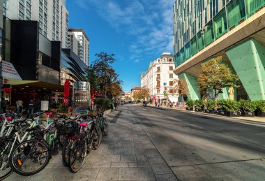 VIENNA, AUSTRIA - SEPTEMBER 27, 2018: People walking by Landstraber Hauptstrabe  - main street in Landstrabe district, running along Wien Mitte train station.