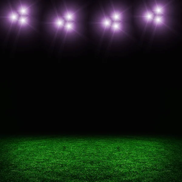 Campo verde de futebol com luzes — Fotografia de Stock