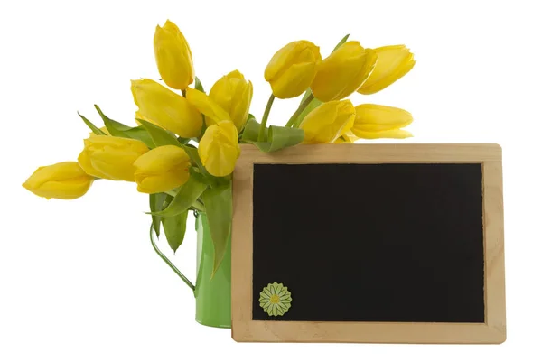 Yellow tulips and blank blackboard — Stock Photo, Image