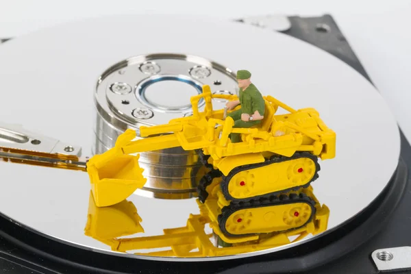 HDD with toy crawler mounted — Stock Photo, Image