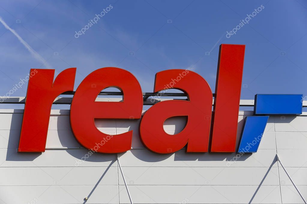 WETZLAR, GERMANY JULY, 2017: Real Logo from Real supermarket. Real is a retail chain of the Metro Group, which operates several hundred supermarkets through the Real Group Holding GmbH in Germany