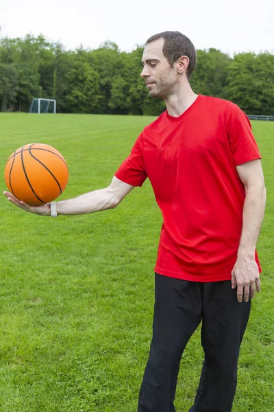 Young man with Basketball — Stock Photo, Image