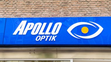 FRANKENBERG, GERMANY - JULY 15, 2019: APOLLO OPTIK Logo on a house facade in Frankenberg. APOLLO - Optik is a German optics company focusing on retail eyewear. It is the biggest optics company in Europe.