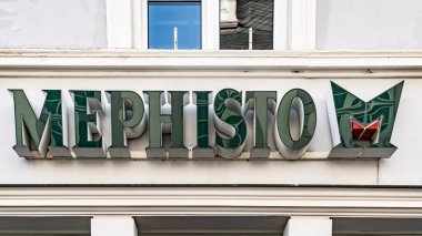 TRIER, GERMANY - SEPTEMBER 13 2019 : Mephisto sign logo on facade in front of shoe store