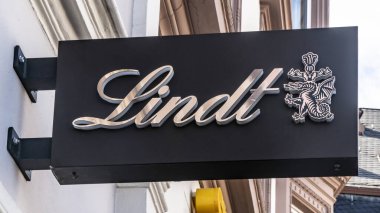 TRIER, GERMANY - SEPTEMBER 13, 2019: Lindt Logo on a House Facade on a retail shop in TRIER, GERMANY.   The brand is one of the most important in chocolates