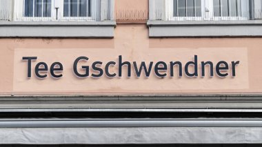 TRIER, GERMANY - SEPTEMBER 13, 2019: Tee Gschwendner Logo on a House facade in Trier. Specialty shop for tea specialties in Trier , Germany 