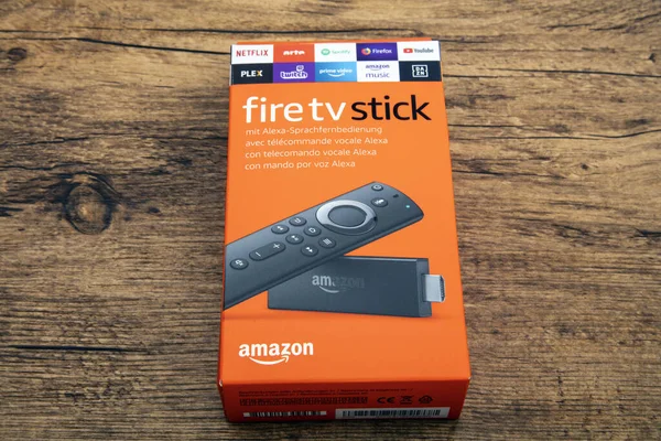 HUETTENBERG, GERMANY - FEBRUARY 03, 2020: Amazon Fire TV stick. Amazon Fire TV Stick is a low cost version in a HDMI-stick format of Amazon Fire TV, Android based.