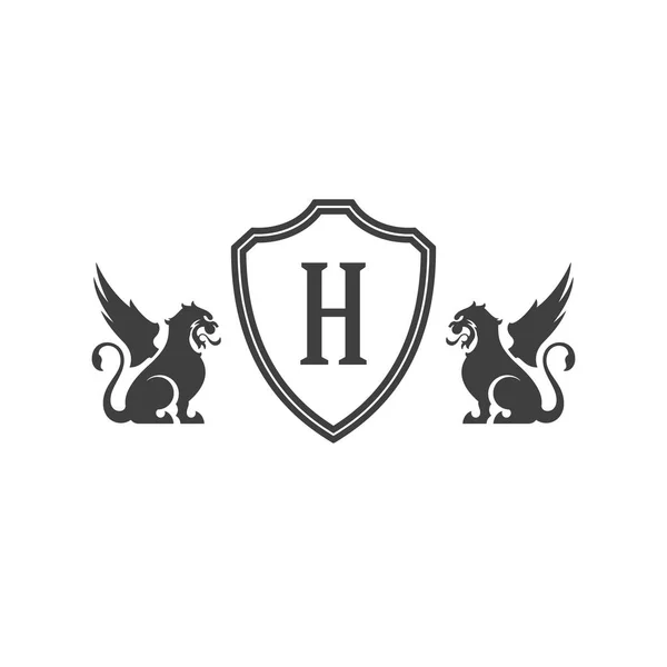 Leões heráldicos e monograma sobre escudo Isolados sobre fundo branco — Vetor de Stock