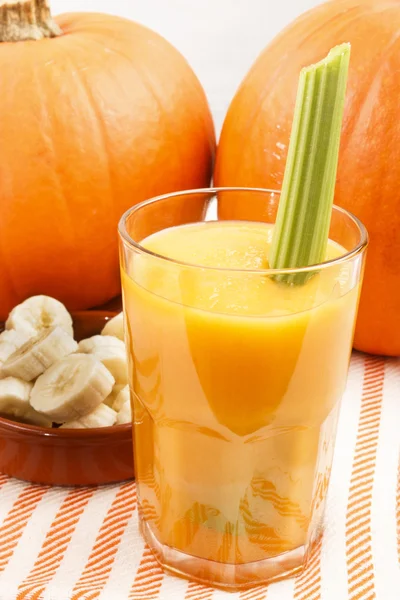 Banana pumpkin smoothie in a glass — Stock Photo, Image