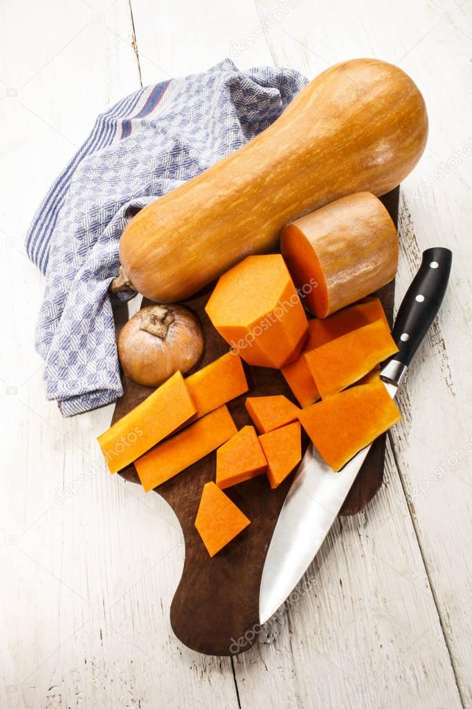 butternut squash on a wooden board