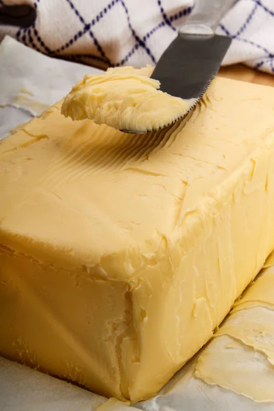 Cold irish butter and a knife — Stock Photo, Image