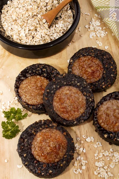 Grilled irish black and white pudding with oats — Stock Photo, Image